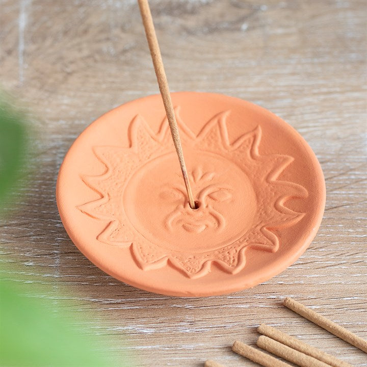 Terracotta sunburst incense plate